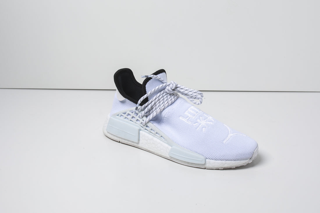 White adidas NMD sneakers are easy to clean with RESHOEVN8R. 